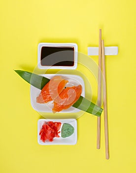 Sushi Set on yellow background. Top view