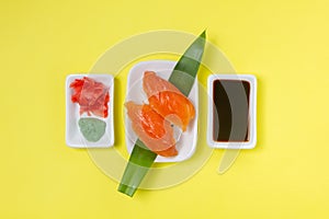 Sushi Set on yellow background. Top view