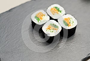 Sushi on a sheet of nori photo