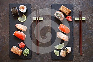 Sushi and sushi rolls, sushi nigiri on stone plate