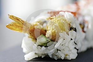 Sushi tempura shrimp roll on slate