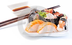 Sushi on white dish isolated