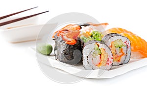 Sushi on white dish isolated