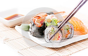 Sushi on white dish isolated