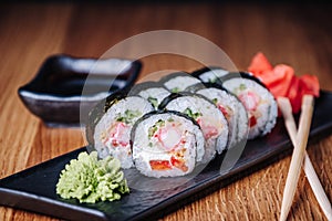 Sushi on a Wooden Table in Restaurant, Delicious Japanese Food, Sushi Rolls