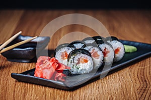 Sushi on a Wooden Table in Restaurant, Delicious Japanese Food, Sushi Rolls