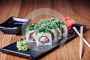 Sushi on a Wooden Table in Restaurant, Delicious Japanese Food, Sushi Rolls