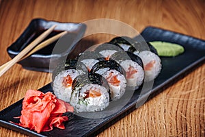 Sushi on a Wooden Table in Restaurant, Delicious Japanese Food, Sushi Rolls