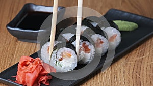 Sushi on a Wooden Table in Restaurant, Delicious Japanese Food, Sushi Rolls