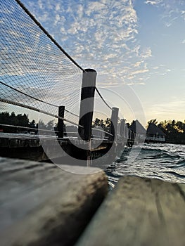 Susnet with amazing sky and high tide waves