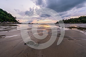 Susnet at Layan beach, lagoon in Phuket, Thailand  during  Low tide