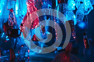 Suspended art objects from the ceiling, painted red and blue creating 3d visualization, abstract background for design. concept.