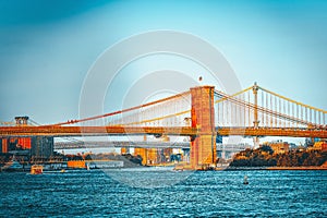Suspended Brooklyn Bridge across Lower Manhattan and Brooklyn. New York, USA