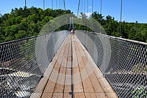 Suspended pedestrian bridge