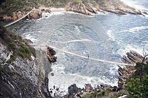 Suspended pedestrian bridges over the cliffs and bays in the Park Tsitsikama