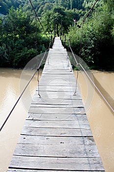 Suspended wood bridge