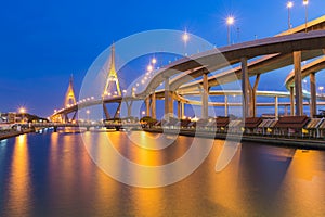 Suspension Bridge across the river at twilight