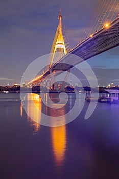 Suspension bridge cross over Bangkok city river night