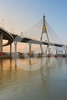 Suspension Bridge cross over Bangkok main river during sunset, Thailand