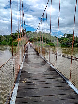 Suspension bridge that crossing Mentarang River, Malinau, outback of Borneo