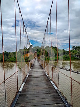 Suspension bridge that crossing Mentarang River, Malinau, outback of Borneo