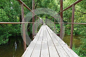 Suspension bridge, Crossing the river, ferriage in the woods