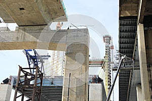 Suspension bridge, large construction site.