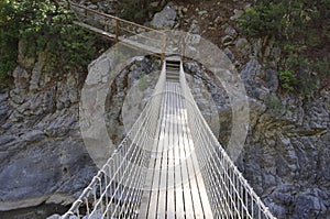 Suspension bridge in the mountains of Turkey in Goynuk canyon