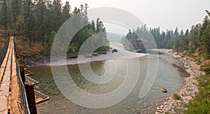 Suspension Bridge over Flathead River at the Spotted Bear Ranger Station / Campground in Montana USA