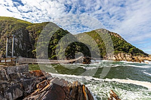 A suspension bridge over the storms river mouth