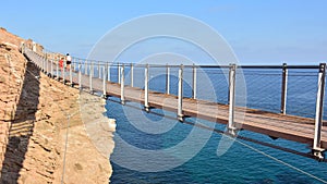 Suspension bridge in Torrenueva Beach, Granada photo