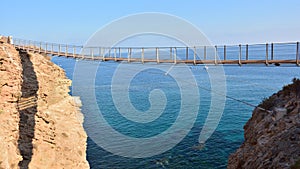 Suspension bridge in Torrenueva Beach, Granada photo