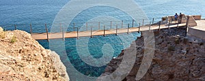 Suspension bridge in Torrenueva Beach, Granada photo