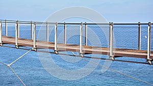 Suspension bridge in Torrenueva Beach, Granada photo