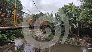 suspension bridge which is still used by local residents