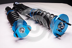 suspension tuning coilovers shock absorbers and springs blue for a sports drift car