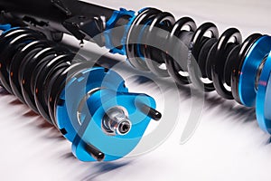 suspension tuning coilovers shock absorbers and springs blue for a sports drift car