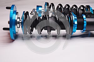 suspension tuning coilovers shock absorbers and springs blue for a sports drift car