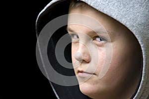 Suspicious hooded boy photo