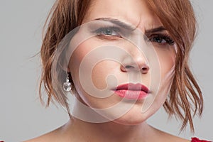 Suspicious look. Distrust in partner