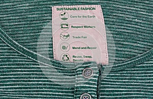 Sustainable fashion label on shirt, care for the environment and ethical fashion concept