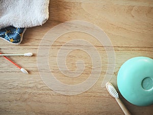 Sustainable plastic free personal care swaps such as reusable ear buds, cotton pads, bamboo toothbrush and solid soap