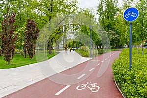 Sustainable transport. Blue road sign or signal of bicycle lane