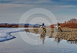 Susuman-Enduro. A motorcycle on river bank