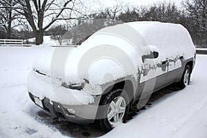 SUV Blanketed with Snow