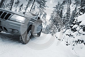 Suv, car, driving in snowy dangerous conditions