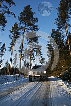 Suv, car driving in snowy terrain