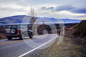 Suv car driving on traveling new zealand highway