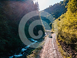 suv car at off road. canyon in carpathian mountains