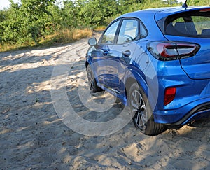 SUV Car Stuck In A Sand On A Outdoor Road Stock Photo
